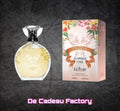 De Cadeau Factory Luxure Olivia Summer Time eau de parfum flesje en verpakking met bloemmotief en vlinderlogo.