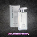 De Cadeau Factory JFENZI Insanity eau de parfum voor dames in een glazen flacon met zilverkleurige verpakking.